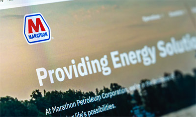 Business fleet drivers managing Marathon fuel card purchases with detailed account reporting
